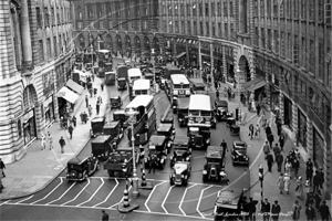 New traffic lights with traffic, Regent Street in Central London c1933
